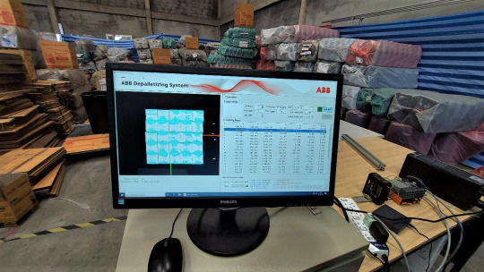 Le logiciel de vision 3D détermine les positions des caisses sur la palette au millimètre près à l'aide du nuage de points