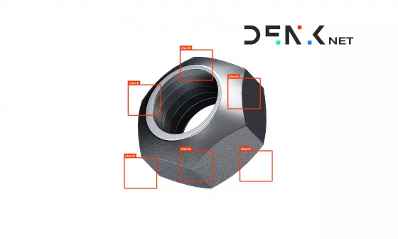 Logo DENKnet au-dessus d'un écrou dont l'absence de défaut a été vérifiée par analyse d'image