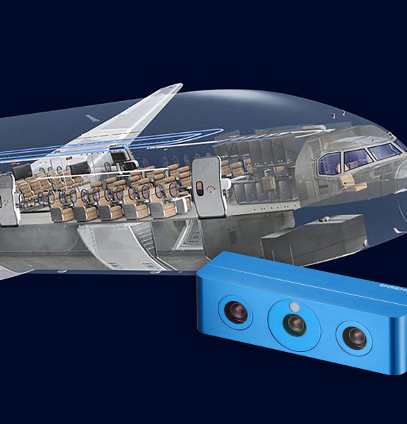 Partie avant d'un avion avec vue sur l'intérieur de la cabine, avec une caméra 3D Ensenso au premier plan.