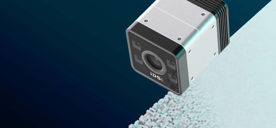 Caméra IDS iTof 3D devant un arrière-plan avec des élévations tridimensionnelles.