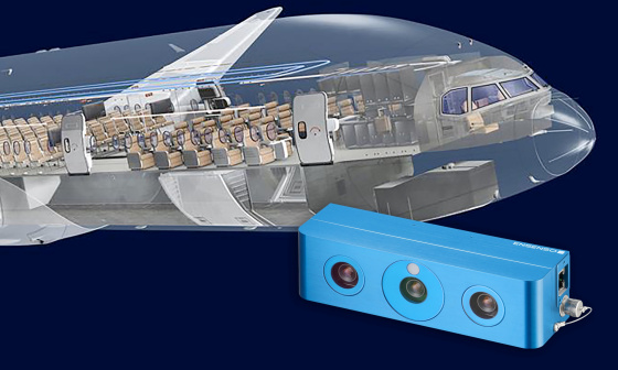 Partie avant d'un avion, vue de l'intérieur de la cabine, avec une caméra 3D Ensenso à l'avant