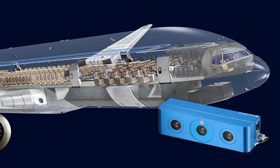 Partie avant d'un avion avec vue sur l'intérieur de la cabine, avec une caméra 3D Ensenso au premier plan.