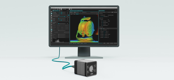 Caméra 3D devant un écran affichant un nuage de points en couleur et une interface logicielle