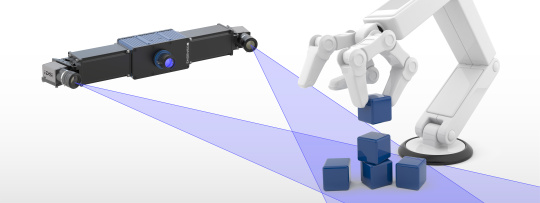 Illustration d'un bras robotisé empilant des caisses et d'une caméra 3D Ensenso.